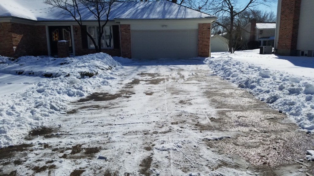 Cleared residential driveway after winter property care by Prayers Lawn & Landscape